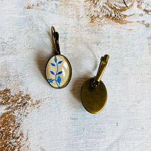 Load image into Gallery viewer, 18 mm Lever Back Oval - Miniature Painting - Foliage Detail - Single Flower Blue